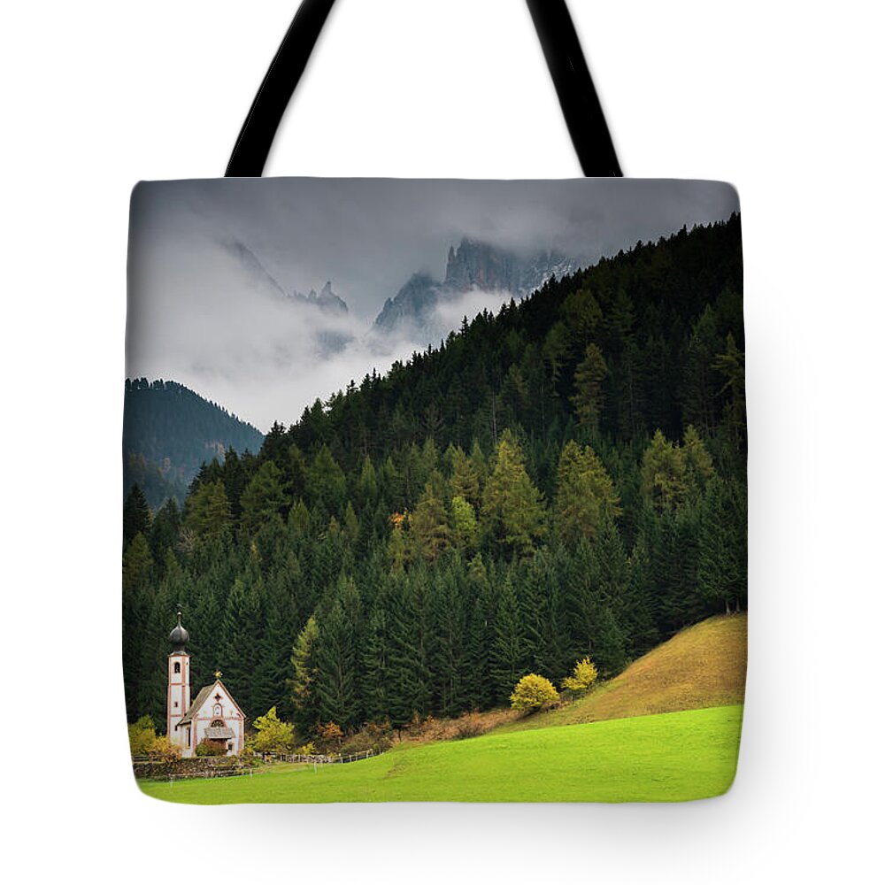 Dolomite Mountains Tote Bag featuring the photograph Beautiful small Alpine church in Italy. by Michalakis Ppalis