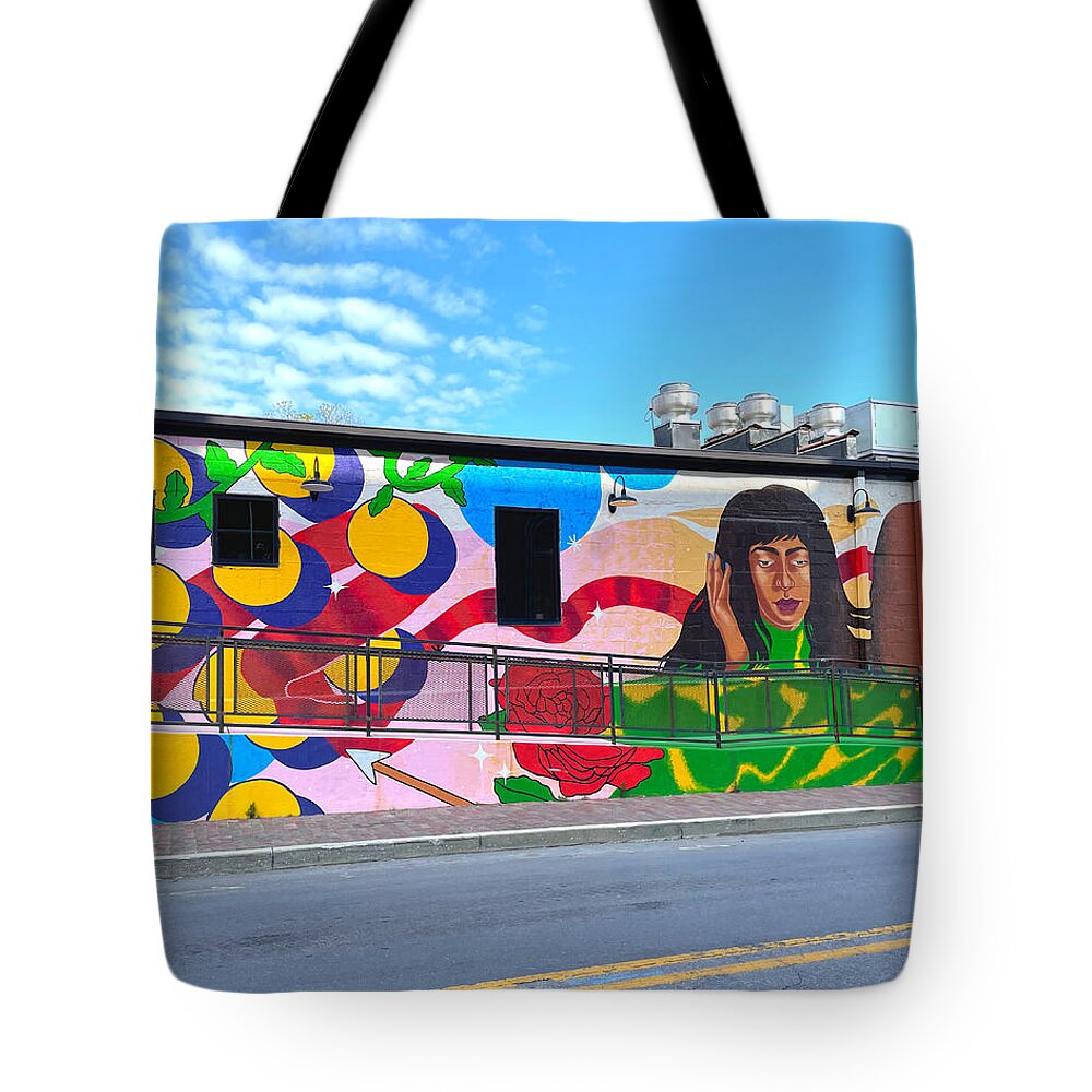 Mural Tote Bag featuring the photograph Beauty on the Building by Lee Darnell