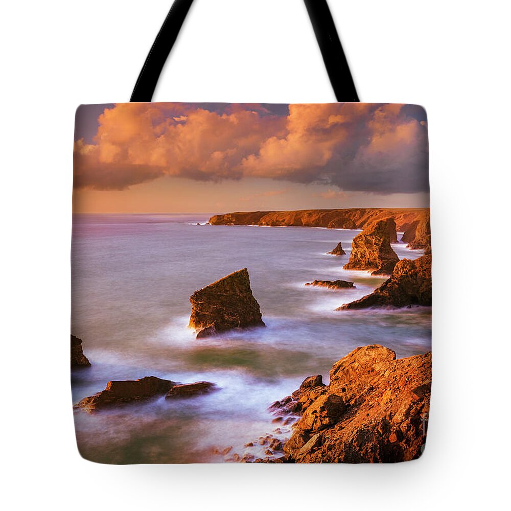 Bedruthan Steps Tote Bag featuring the photograph Bedruthan Steps Sunset, Cornwall, England by Neale And Judith Clark