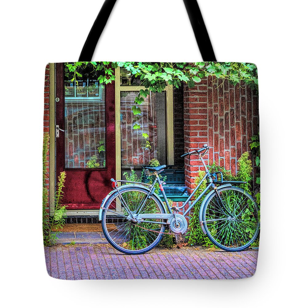 Fall Tote Bag featuring the photograph Bicycle Along the Streets of Amsterdam II by Debra and Dave Vanderlaan