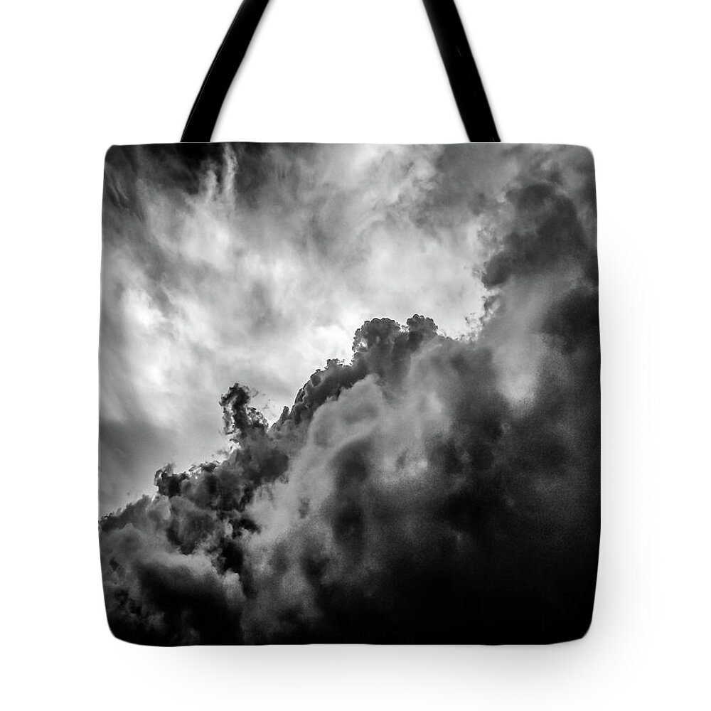 Nature Tote Bag featuring the photograph Black and white Clouds by Louis Dallara