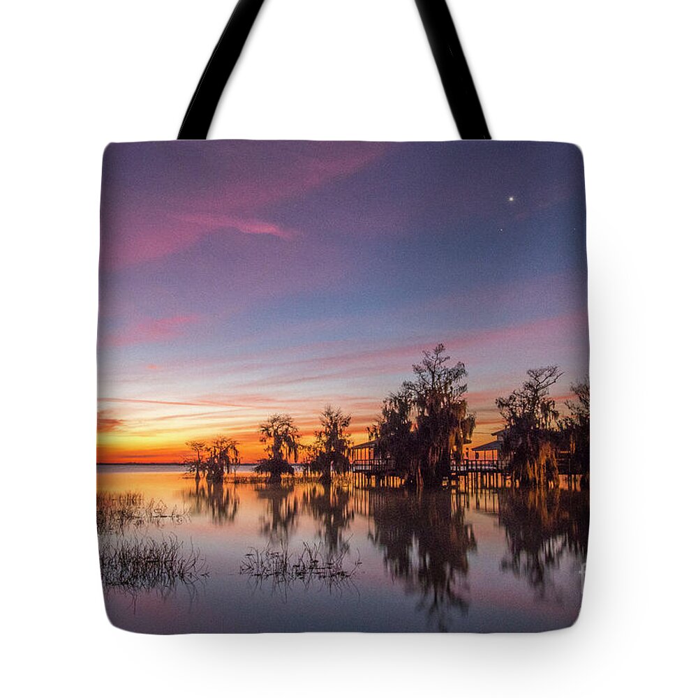 Sun Tote Bag featuring the photograph Blue Cypress Horizon Glow by Tom Claud