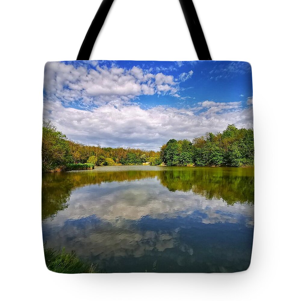 Landscape Tote Bag featuring the photograph Blue Sky Blue Water by Tito Slack