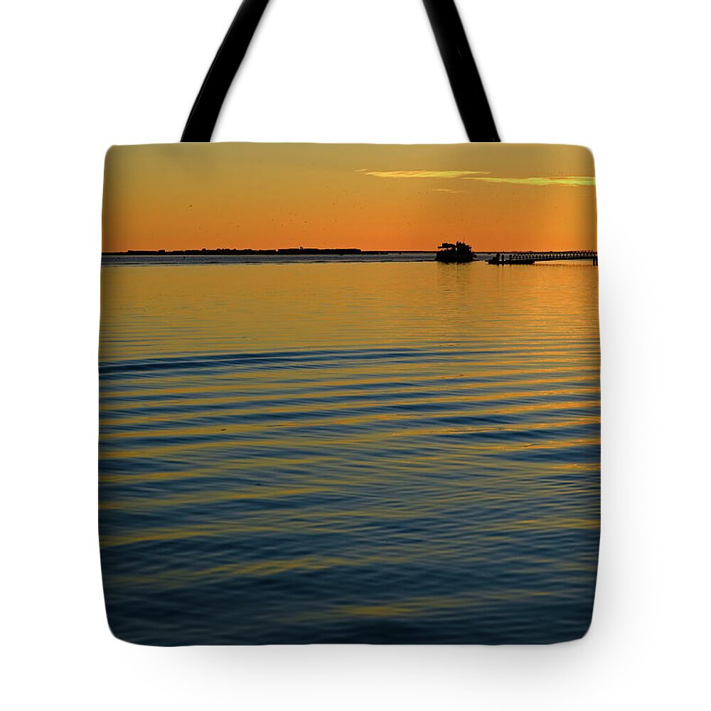 Ria Formosa Tote Bag featuring the photograph Boat and dock at dusk by Angelo DeVal
