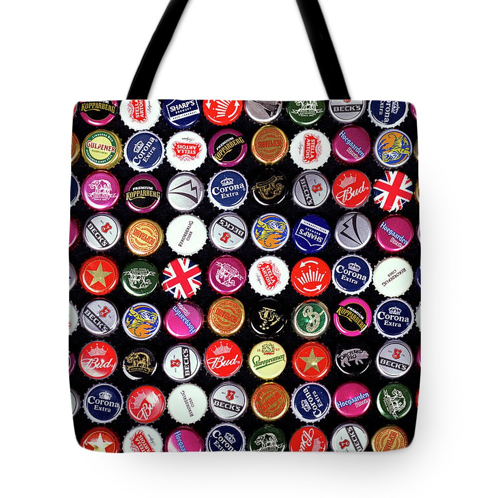 Bottle Tote Bag featuring the photograph Bottle cap background by Jane Rix