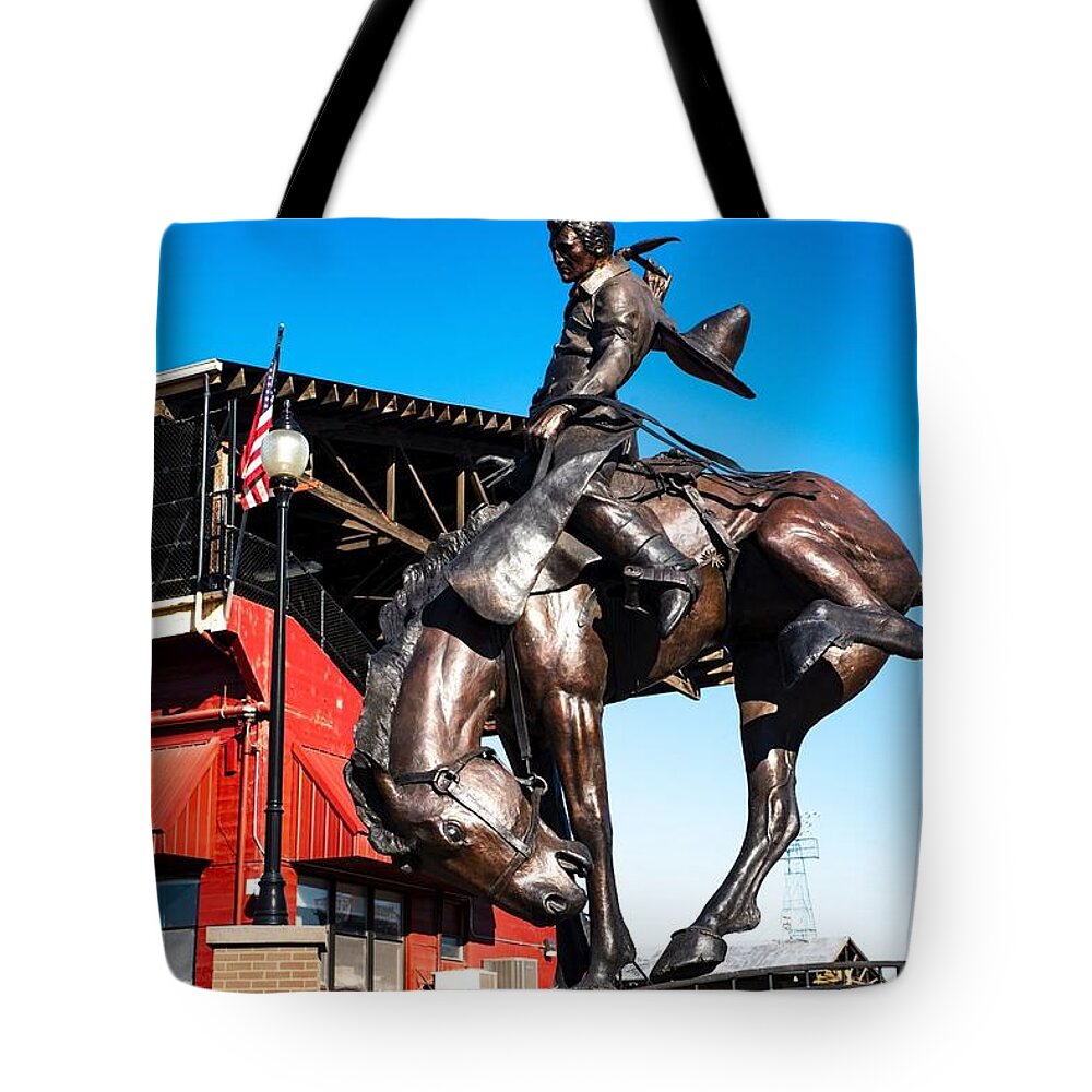 Bronc Rider Tote Bag featuring the photograph Bronc Rider by Tom Cochran