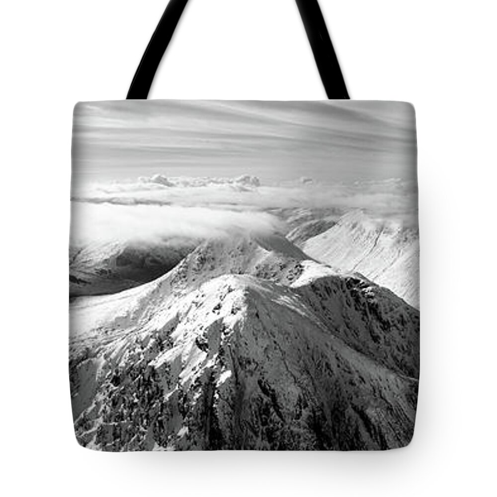 Panorama Tote Bag featuring the photograph Buachaille Etive Mor Stob Dearg mountain aerial Glencoe Scotland black and white by Sonny Ryse