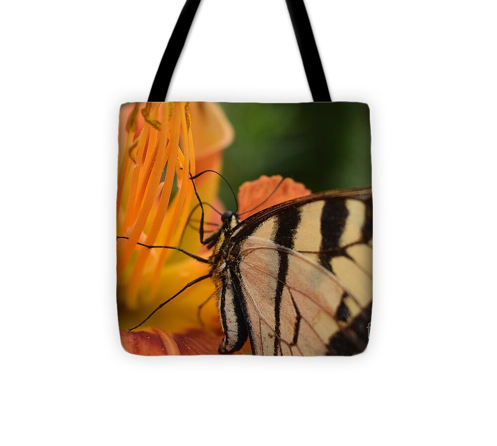 Flowers Tote Bag featuring the photograph Butterfly Beauty in Lily by Christina Verdgeline