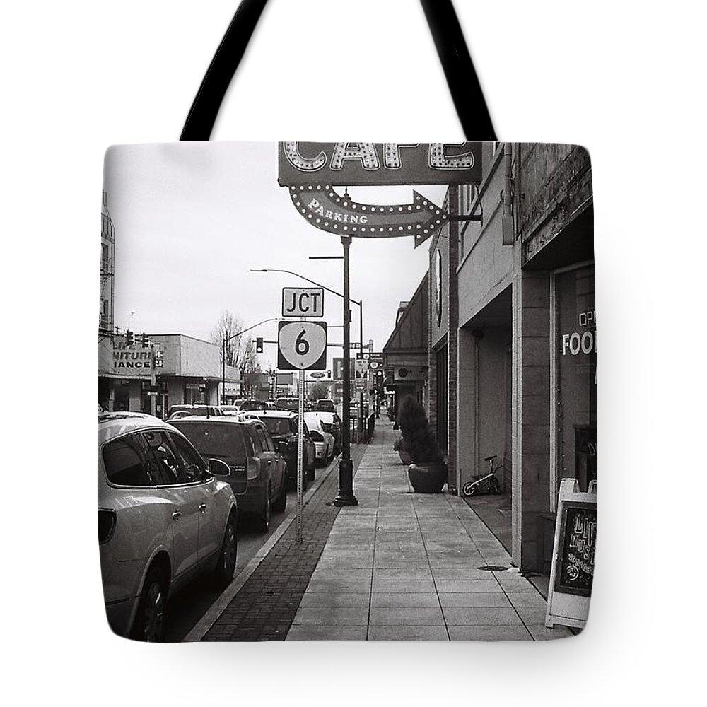 Street Photography Tote Bag featuring the photograph Cafe in Quiet Town by Chriss Pagani