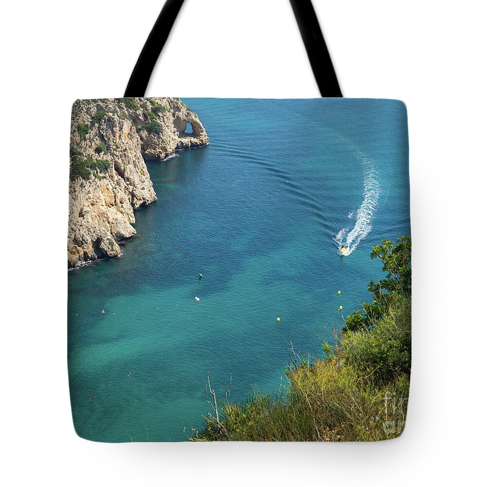 Mediterranean Sea Tote Bag featuring the photograph Cala de la Granadella, boat trip on the Mediterranean Sea by Adriana Mueller