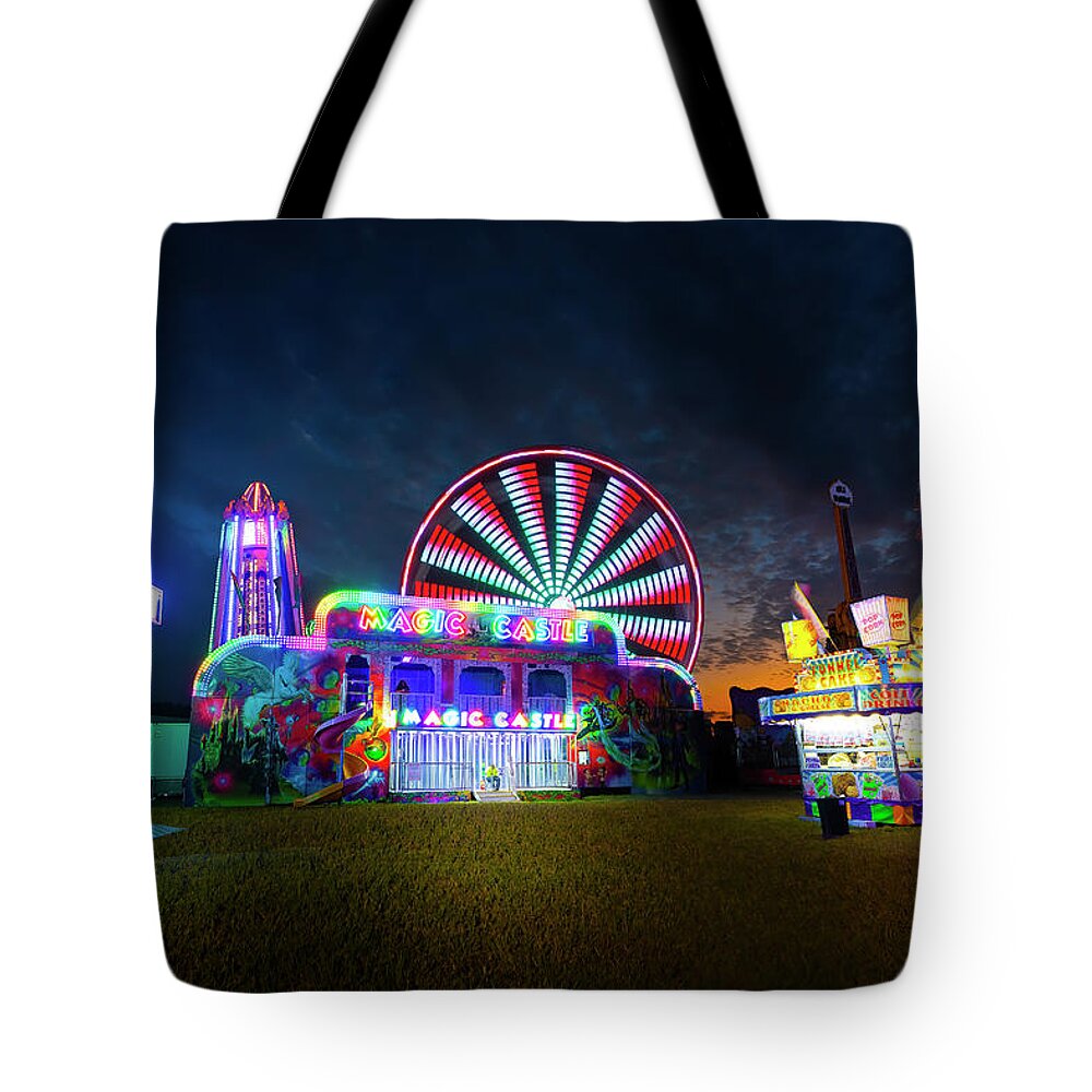 Swing Ride Tote Bag featuring the photograph Carnival Lights and Midway Delights - Standard Version by Mark Andrew Thomas