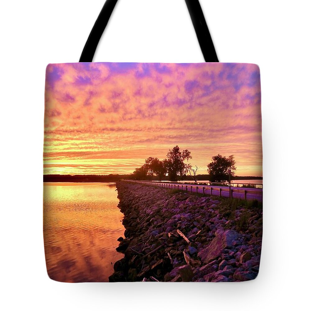 Sunset Tote Bag featuring the photograph Champlain Islands Causeway by Mike Reilly