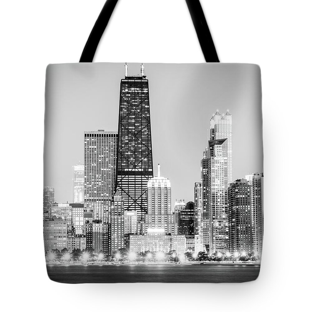 2012 Tote Bag featuring the photograph Chicago Night Skyline Black and White Photo by Paul Velgos
