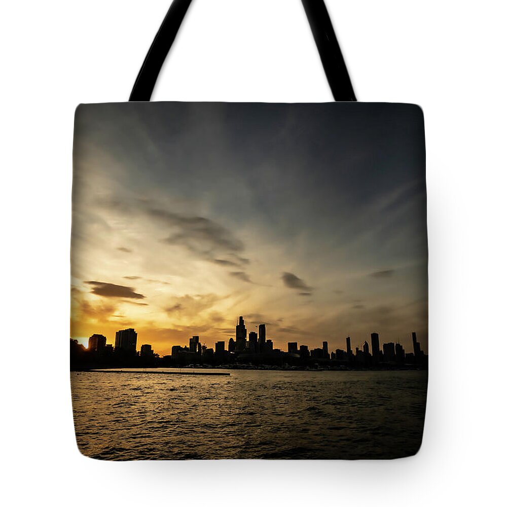 Burham Harbor Tote Bag featuring the photograph Chicago skyline silhouette by Sven Brogren