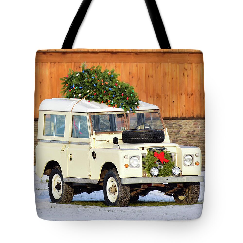 Land Rover Tote Bag featuring the photograph Christmas Land Rover by Nicole Lloyd
