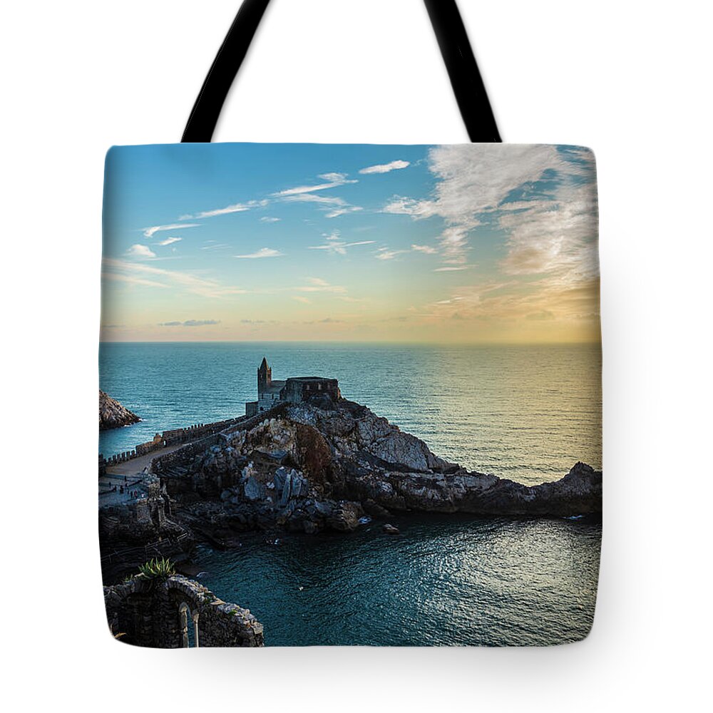 Cinque Terre Tote Bag featuring the photograph Church of St. Peter at sunset in Porto Venere by Fabiano Di Paolo