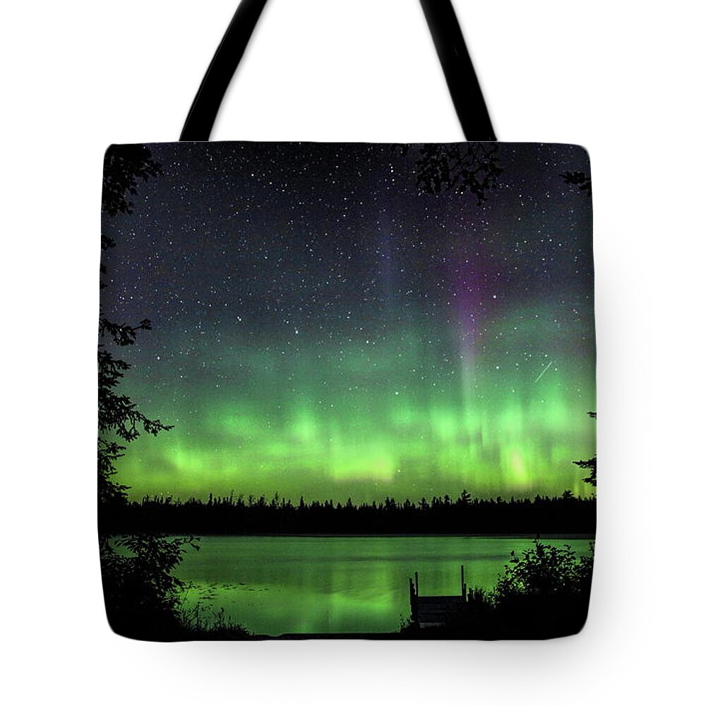 Aurora Borealis Tote Bag featuring the photograph Circle Of Northern Lights by Dale Kauzlaric