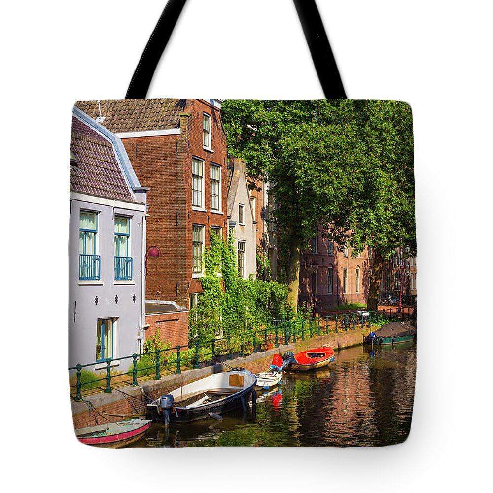 City Tote Bag featuring the photograph City canal in Amsterdam by Fabiano Di Paolo