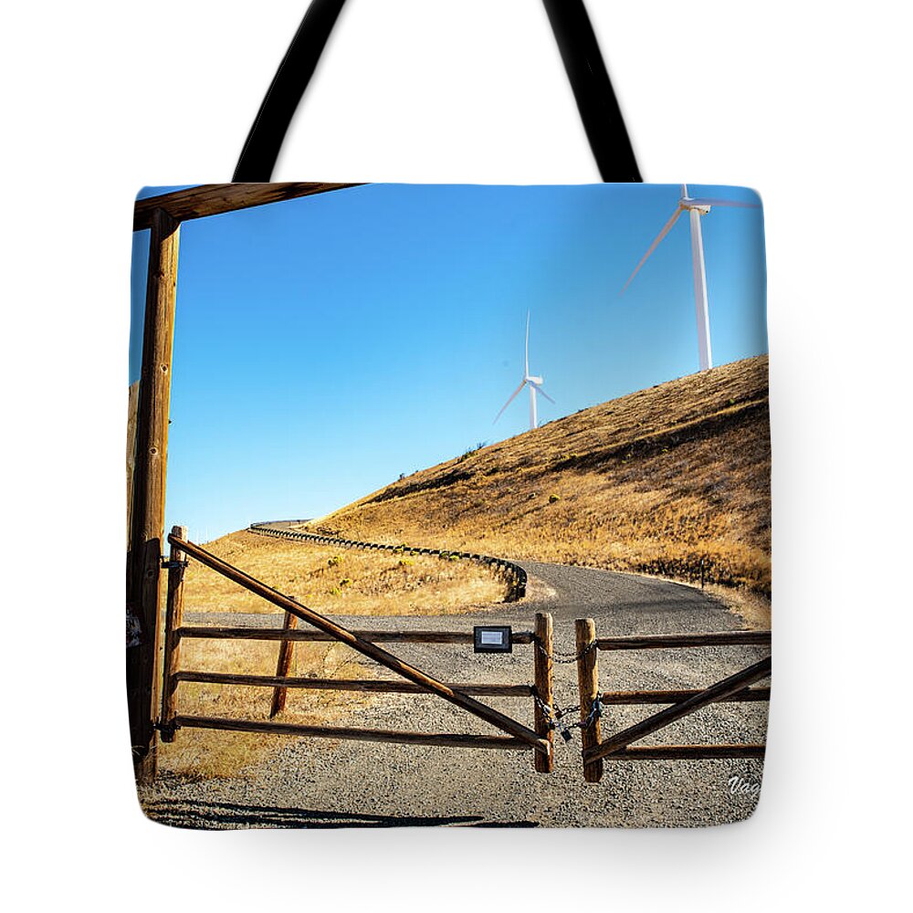Clean Power And Old Ranch Gates Tote Bag featuring the photograph Clean Power and Old Ranch Gates by Tom Cochran