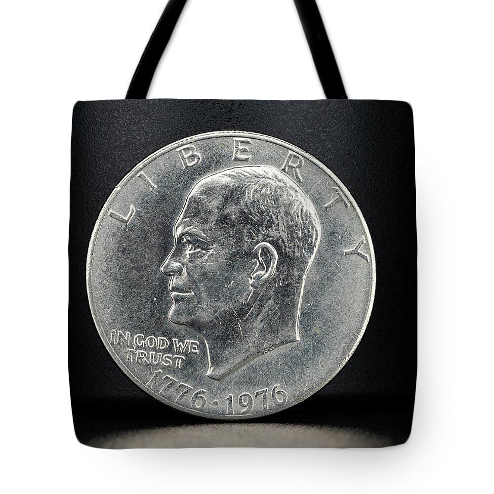 Ike Eisenhower Tote Bag featuring the photograph Coin Collecting - 1776-1976 Ike Eisenhower Dollar Coin Face by Amelia Pearn