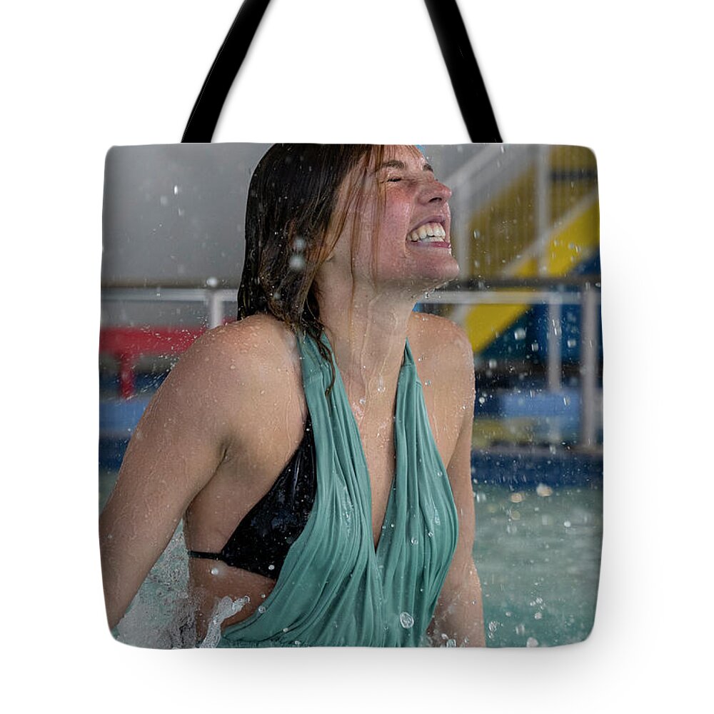Fun Tote Bag featuring the photograph Cold smile as water poring over model by Dan Friend
