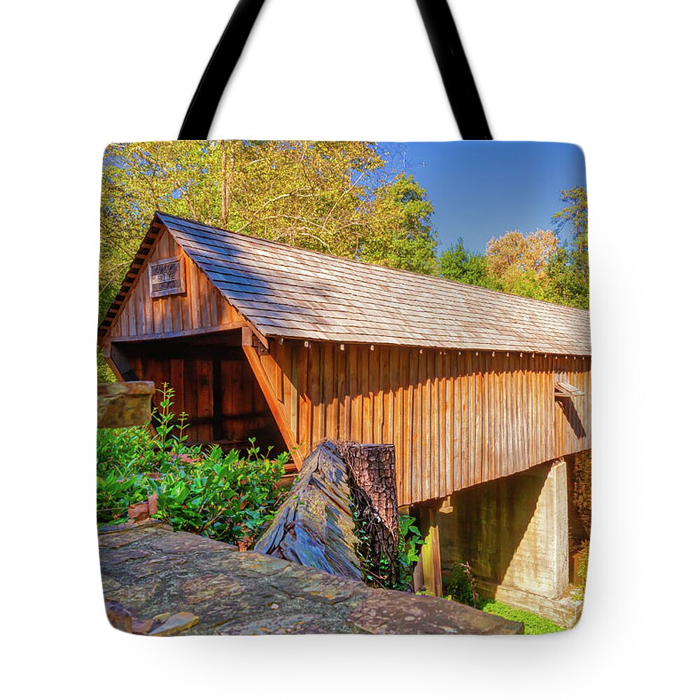 Atlanta Tote Bag featuring the photograph Concord Covered Bridge Caretaker View by Donna Twiford