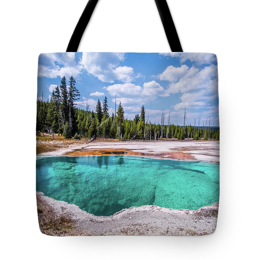 Yellowstone Tote Bag featuring the photograph Crystalline water in Yellowstone by Alberto Zanoni