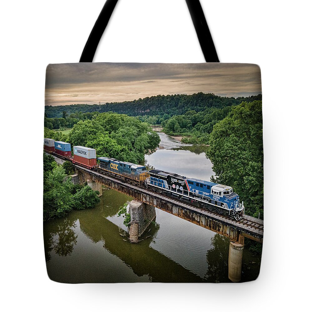 Railroad Tote Bag featuring the photograph CSXT 3195 Spirit of our Law Enforcement unit at Harpeth River at Pegram Tennessee by Jim Pearson