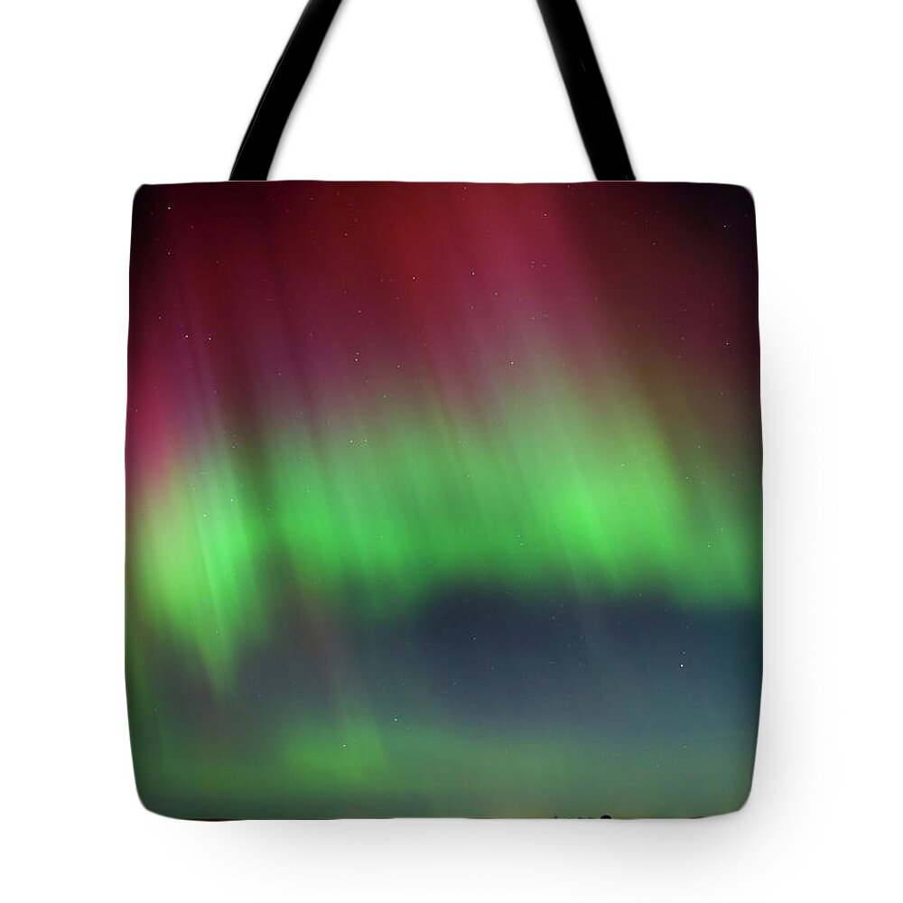 Northern Light Tote Bag featuring the photograph Dance in the sky by Canadart -