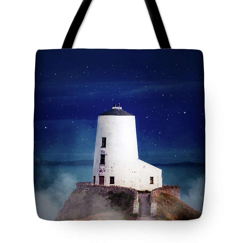 Tŵr Mawr Lighthouse Tote Bag featuring the photograph Dark and moody Twr Mawr Lighthouse, North Wales by Victoria Ashman