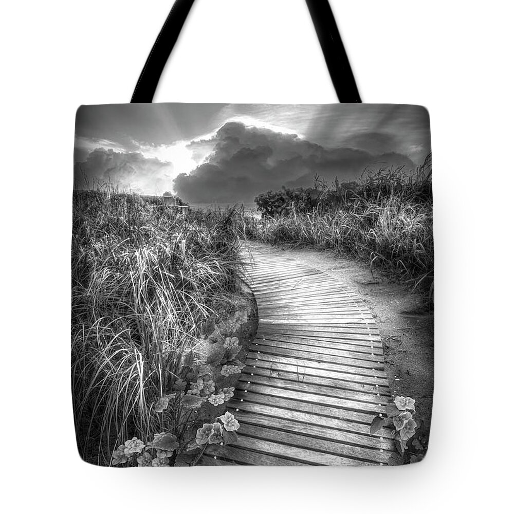 Clouds Tote Bag featuring the photograph Dawn's Glory in Black and White by Debra and Dave Vanderlaan