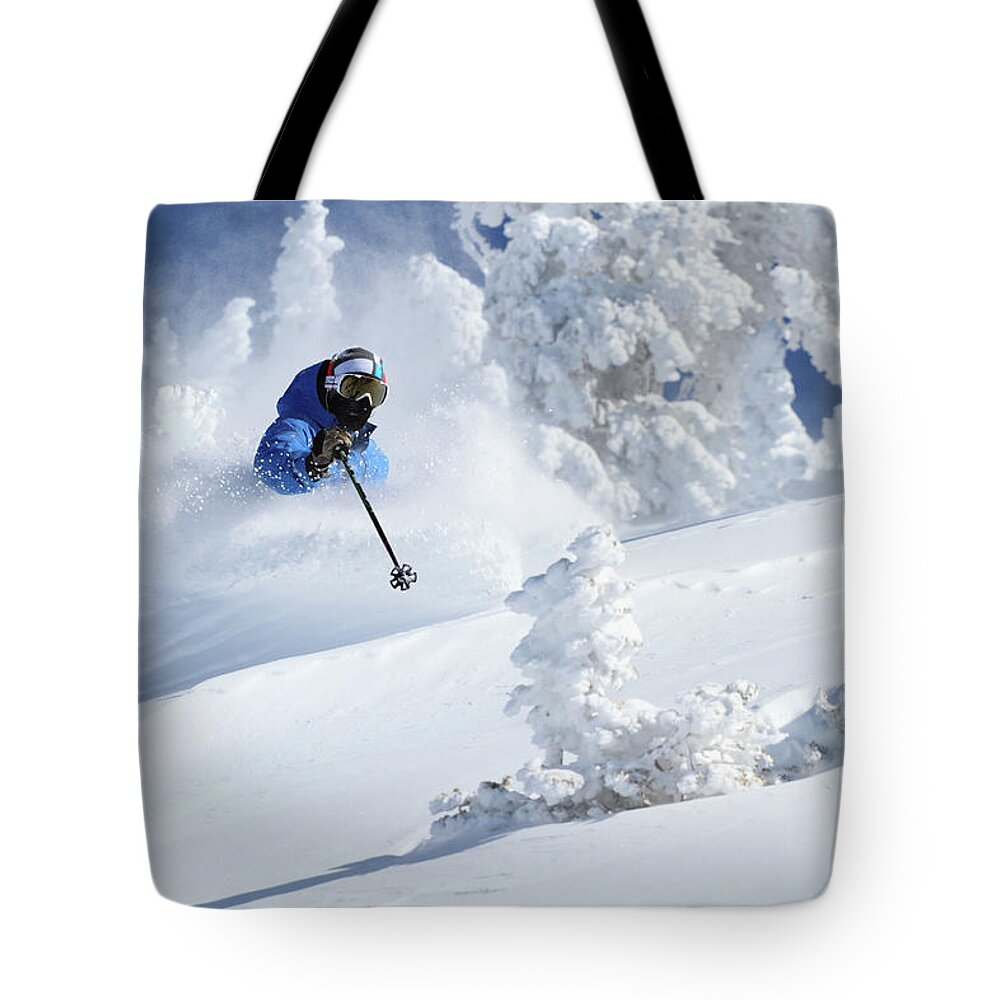 Utah Tote Bag featuring the photograph Deep Powder Skier - Snowbird, Utah by Brett Pelletier