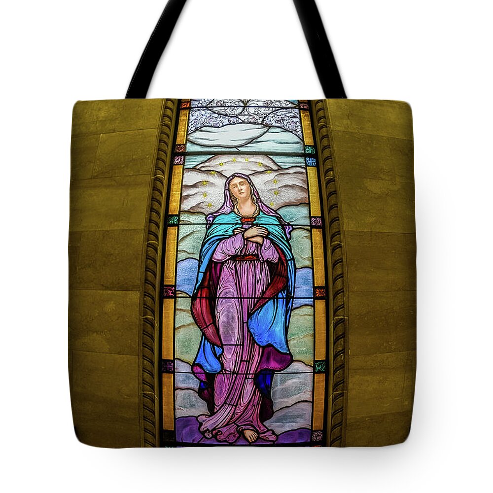 Virgin Mary Tote Bag featuring the photograph Deliverance by Emerita Wheeling
