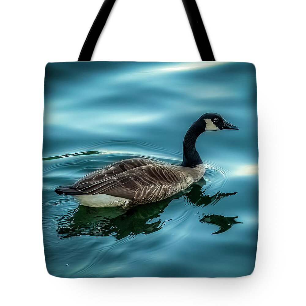 Vivid Tote Bag featuring the photograph Dodge and Burn Goose by Rob Green