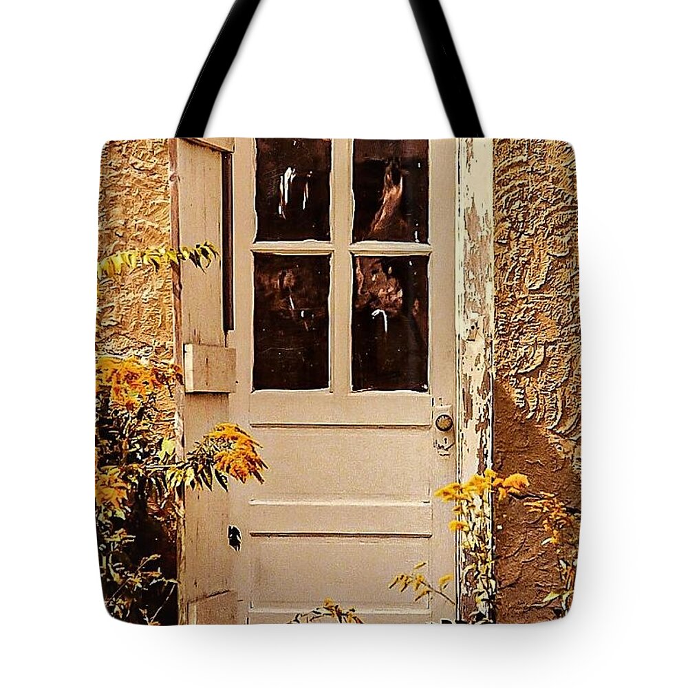 Door Yellow Wood Flower Tote Bag featuring the photograph Door1 by John Linnemeyer