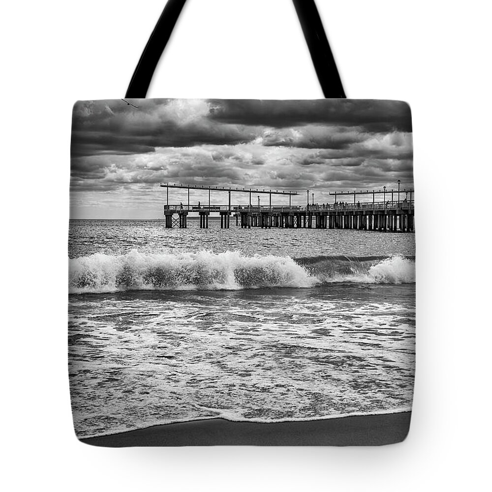 Coney Island Tote Bag featuring the photograph Dramatic Waves and Clouds by Cate Franklyn