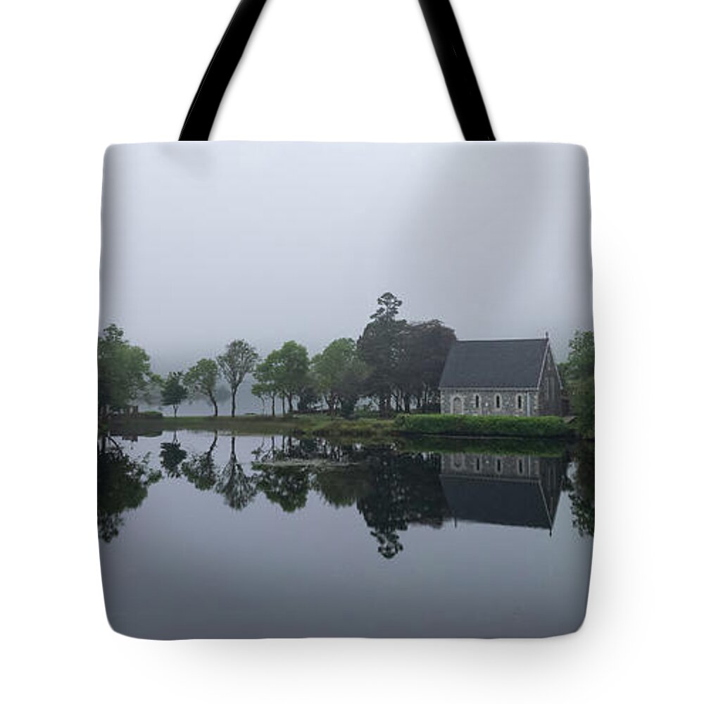 County Cork Tote Bag featuring the photograph Drone photo of St. Finbarr Church, Gougane Barra Cork Ireland by Michalakis Ppalis