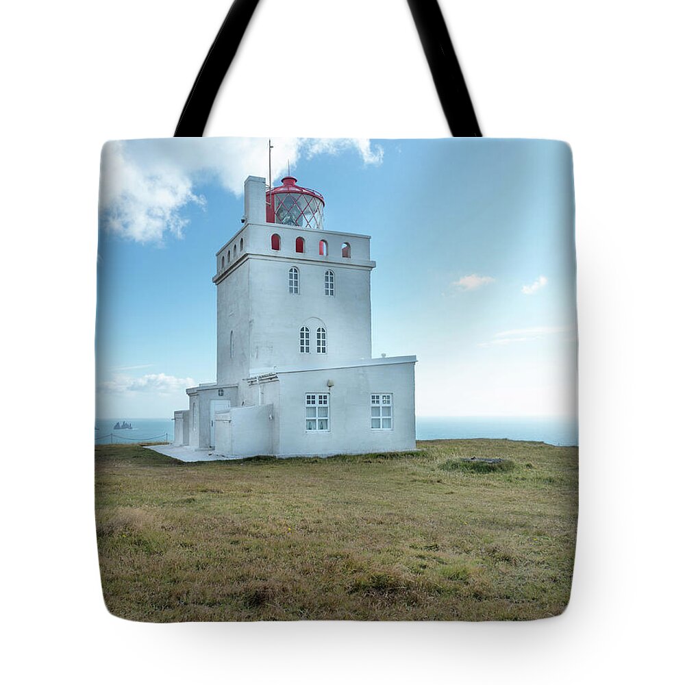 Travel Tote Bag featuring the photograph Dyrholaey Lighthouse by Kristia Adams