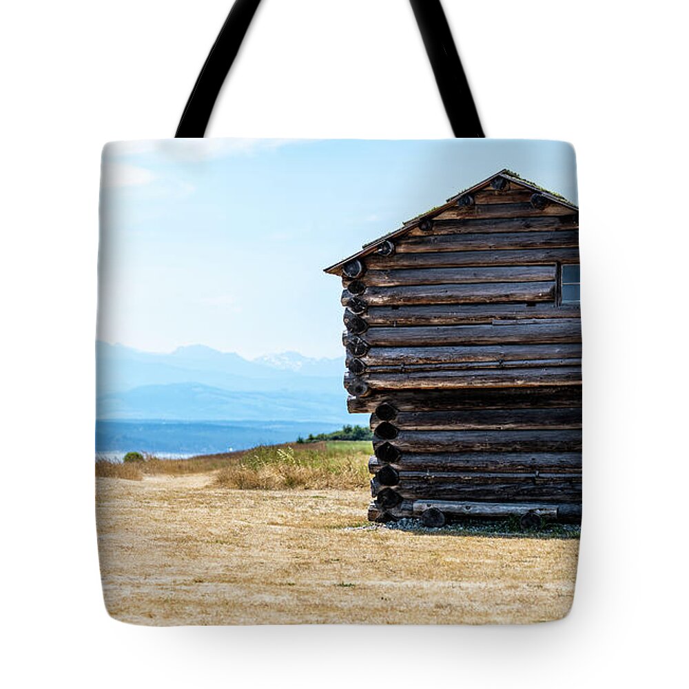 Ebey's Blockhouse And Olympic Mountains Tote Bag featuring the photograph Ebey's Blockhouse and Olympic Mountains by Tom Cochran