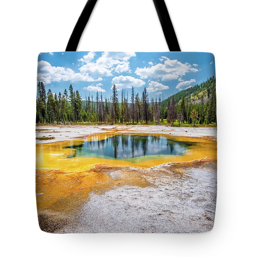 Yellowstone Tote Bag featuring the photograph Emerald spring in Yellowstone by Alberto Zanoni