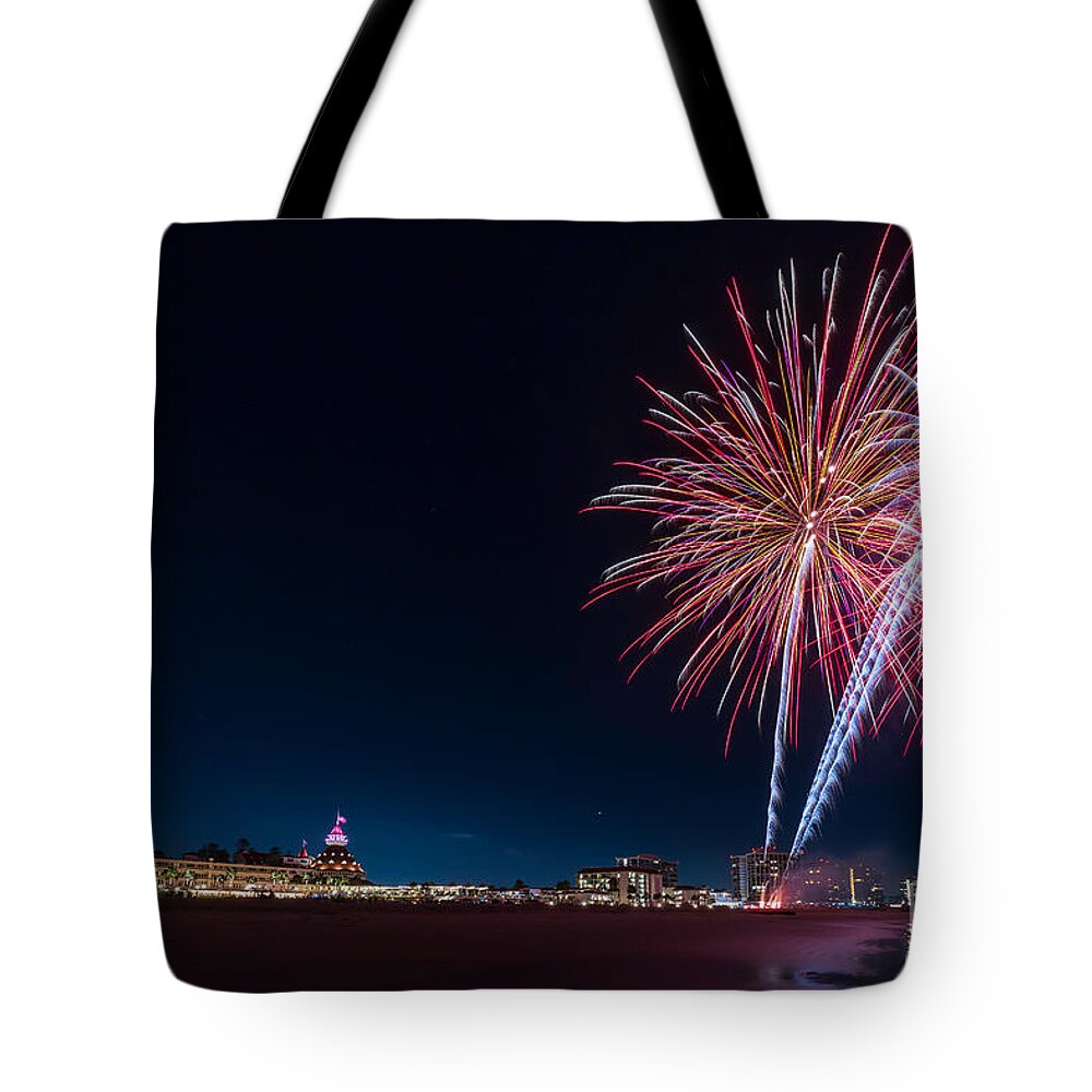 Resort Tote Bag featuring the photograph Evening fireworks display at the Hotel del Coronado on the beach along the Pacific Ocean by Sam Antonio