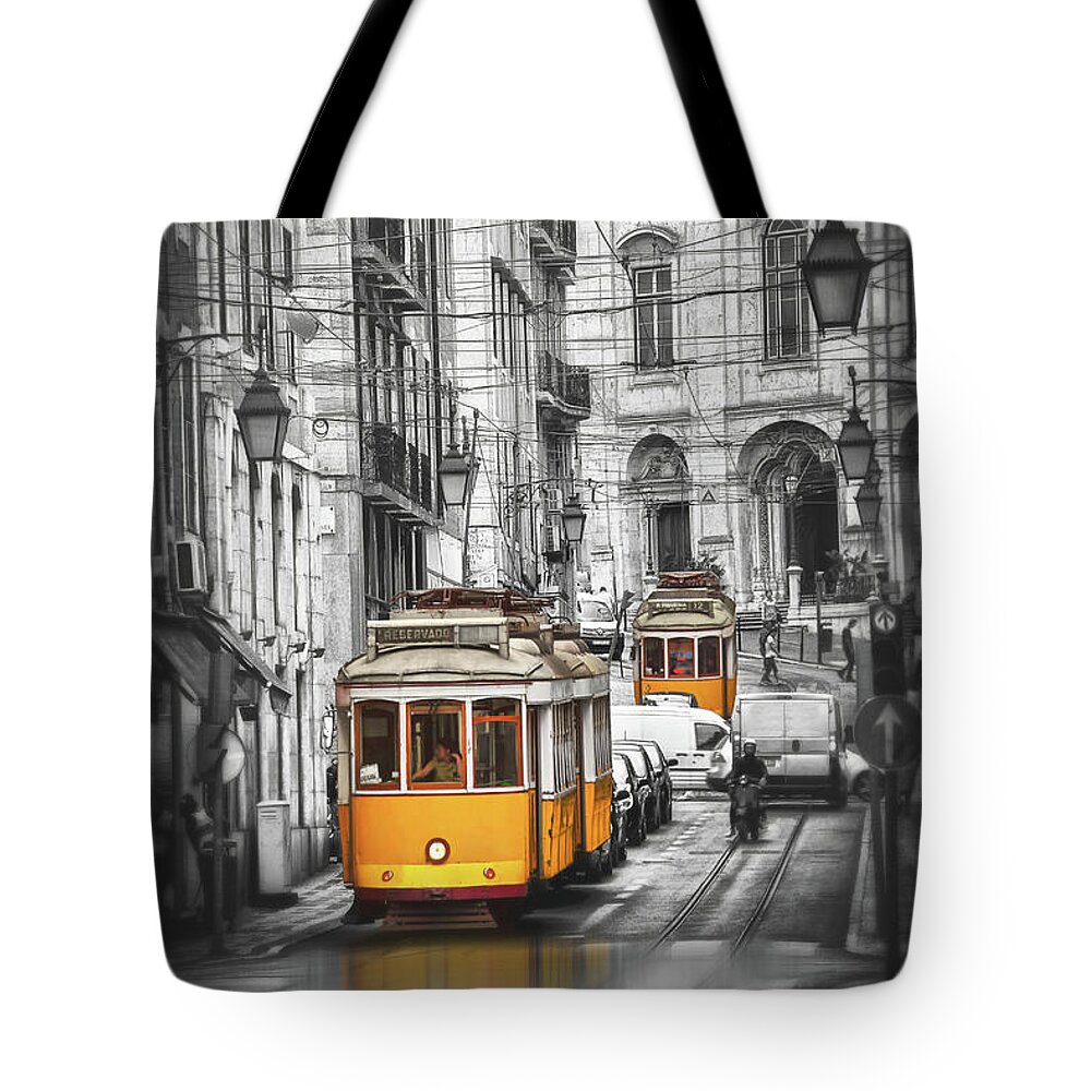 Lisbon Tote Bag featuring the photograph Famous Yellow Streetcars of Lisbon Portugal by Carol Japp