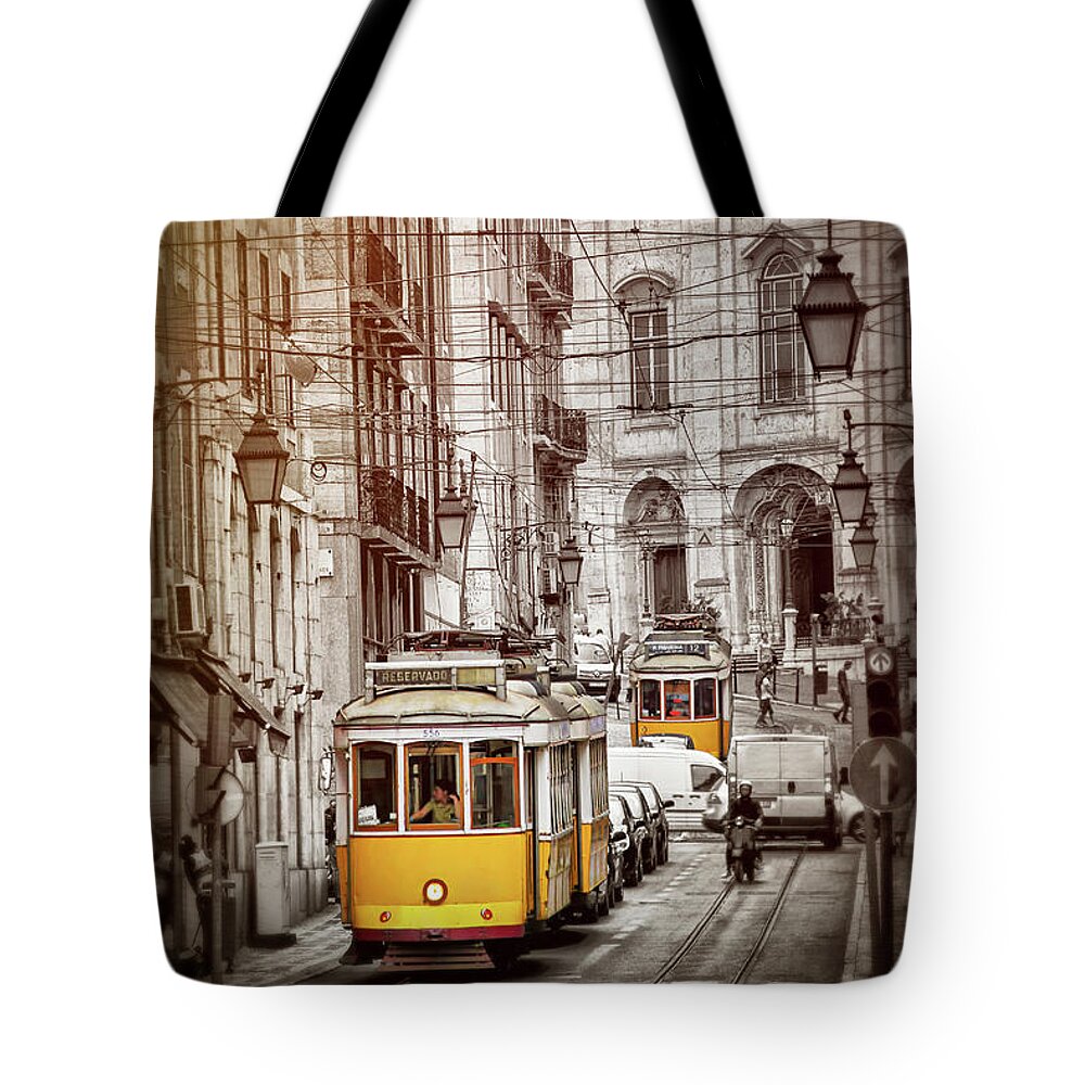 Lisbon Tote Bag featuring the photograph Famous Yellow Trams of Lisbon Portugal by Carol Japp