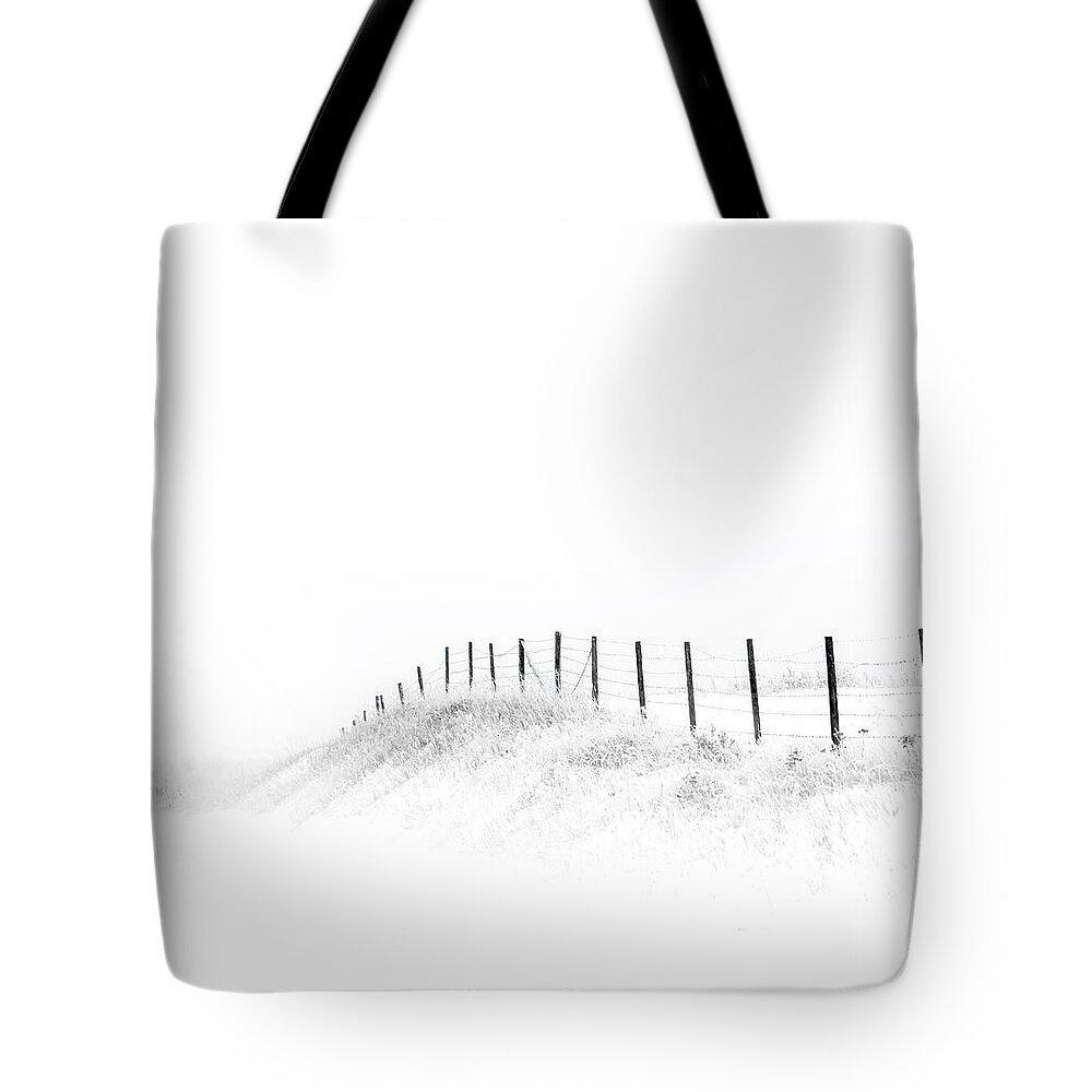 High Key Tote Bag featuring the photograph Fenceline In The Snow by Dan Jurak