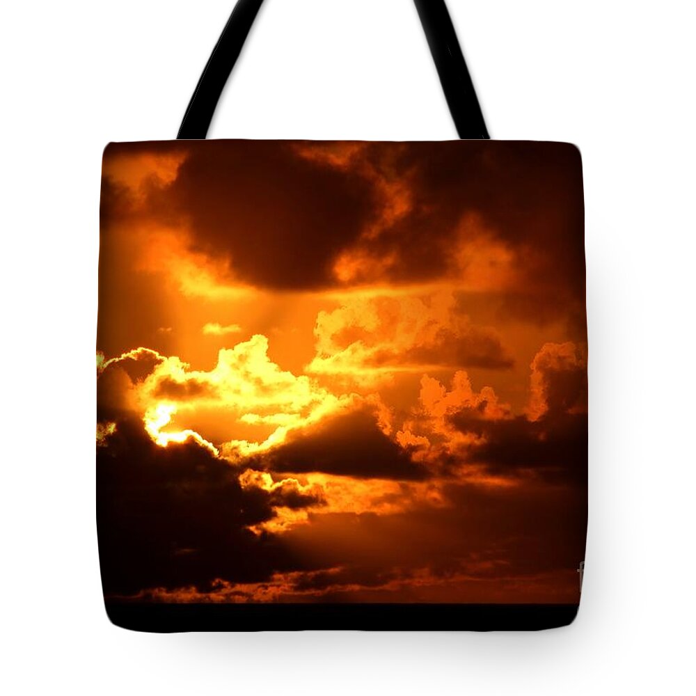 Firey Sunrise Tote Bag featuring the photograph Fire Over the Ocean by Mary Deal