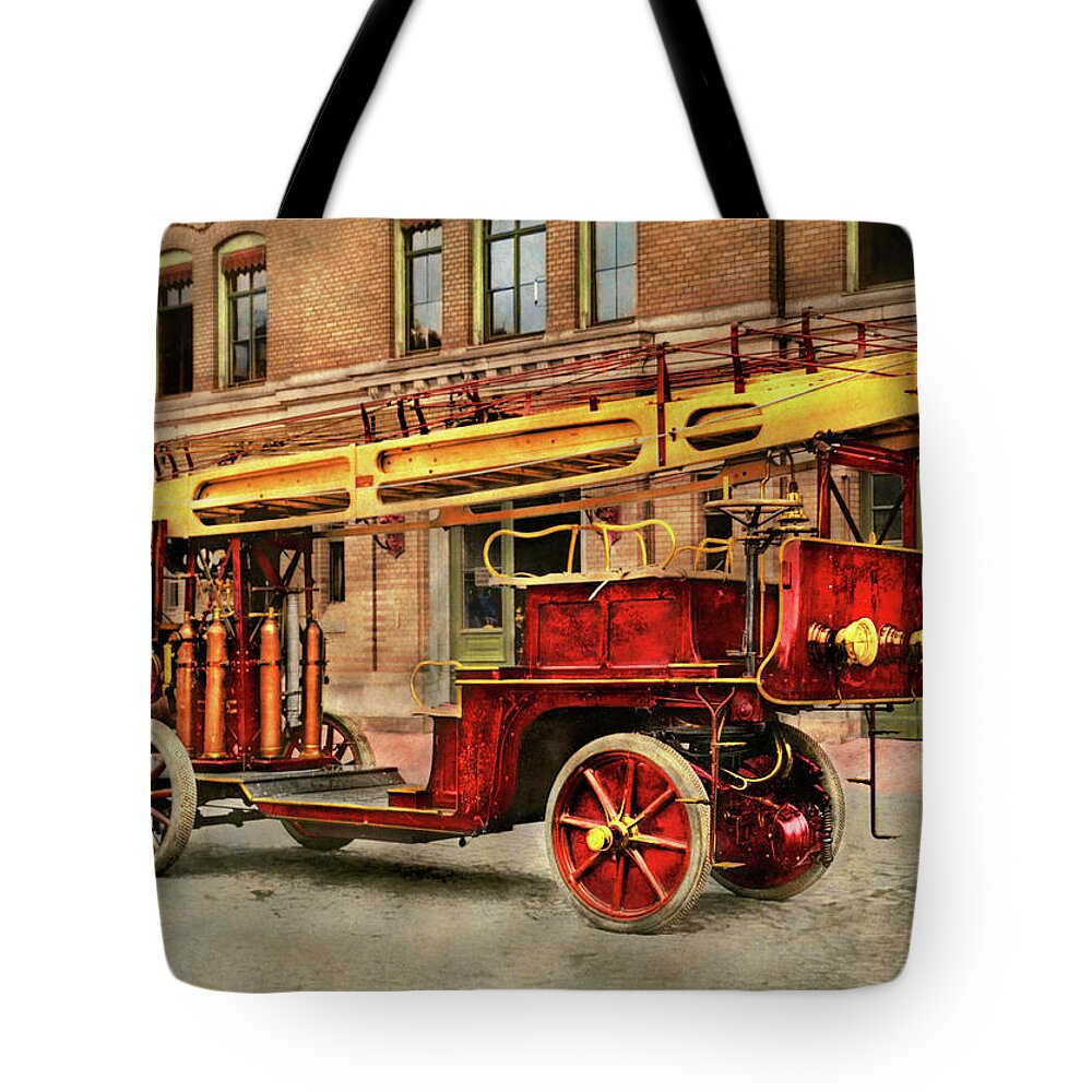 Fireman Art Tote Bag featuring the photograph Fire Truck - An electric ladder truck 1907 by Mike Savad