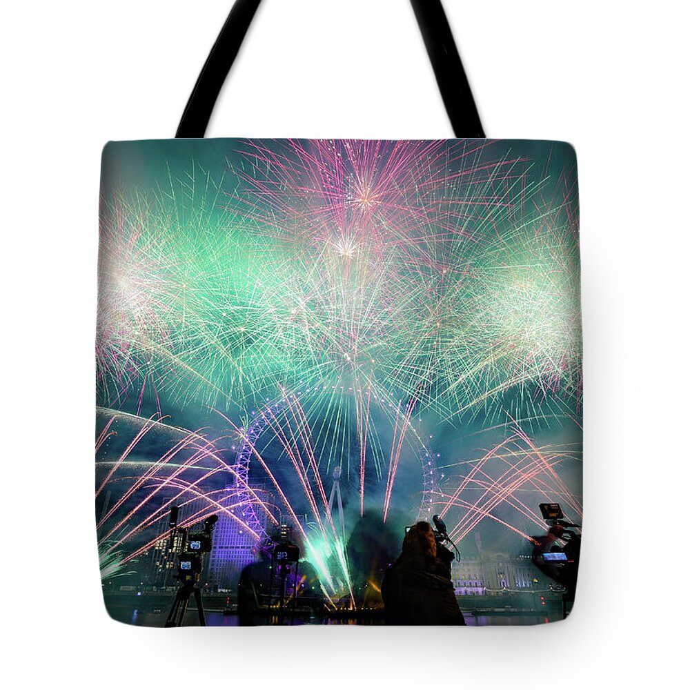 Fireworks Tote Bag featuring the photograph Fireworks at New years Eve by Andrew Lalchan