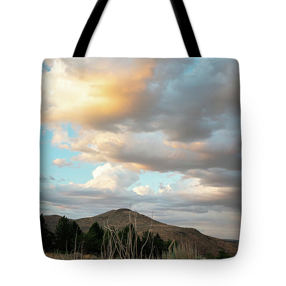 Sunset Tote Bag featuring the photograph First Glow by Ron Long Ltd Photography