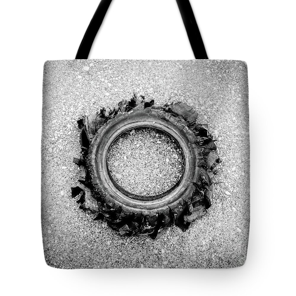 Blown Tote Bag featuring the photograph Flat Tire BW by Troy Stapek