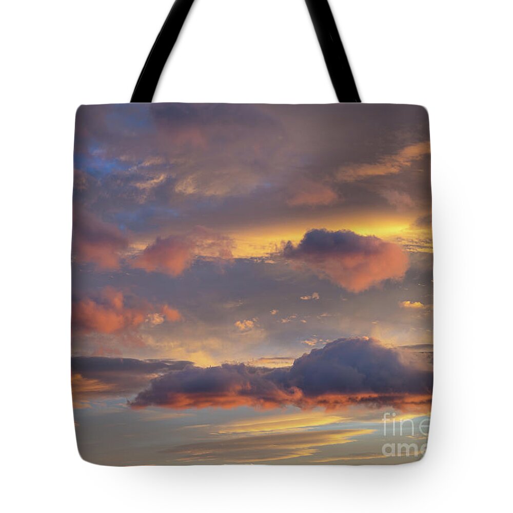 Clouds Tote Bag featuring the photograph Floating in the clouds by Adriana Mueller
